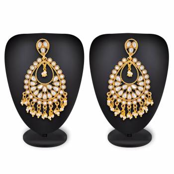 For Your Heavy Traditionals, Grab This Beautiful And Attractive Looking Earrings Set In Golden Color Beautified With Stone Work. This Can Also Be Paired With Any Colored Attire.