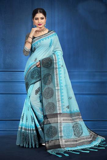 Add This Pretty Saree For your Semi-Casual Wear With Floral Prints All Over. This Saree And Blouse Are Fabricated On Linen Which Ensures Superb Comfort All Day Long