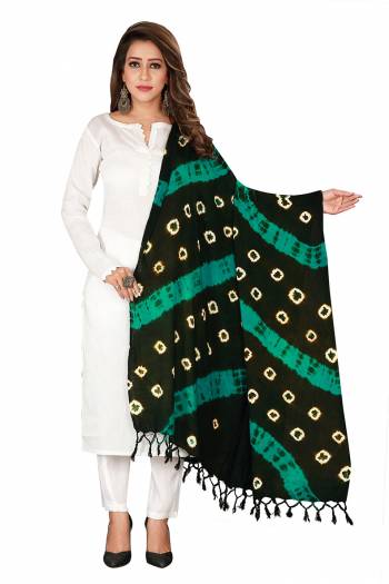 Here Is A Very Pretty Dupatta Perfect For Summers. This Pretty Dupatta Is Cotton Based Beautified With Bandhani Prints All Over It. Pait This Up With Any Same Or Contrasting Colored Kurti. 