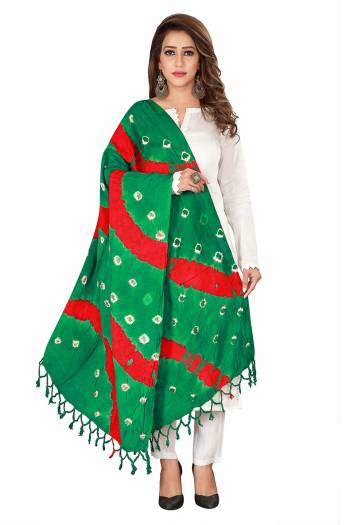 Here Is A Very Pretty Dupatta Perfect For Summers. This Pretty Dupatta Is Cotton Based Beautified With Bandhani Prints All Over It. Pait This Up With Any Same Or Contrasting Colored Kurti. 