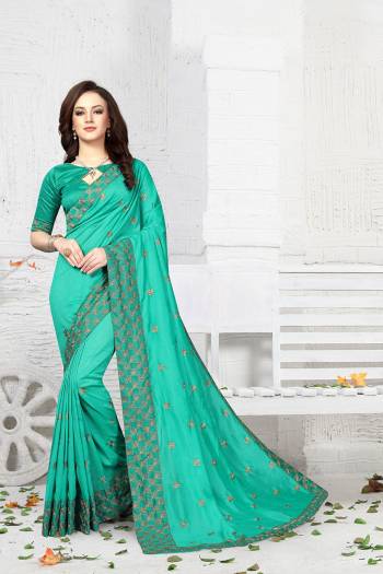 Celebrate This Festive Season With Ease And Comfort Wearing This Designer Saree In Sea Green Color Paired With Sea Green Colored Blouse. This Saree And Blouse are Silk Based Beautified With Jari Work.