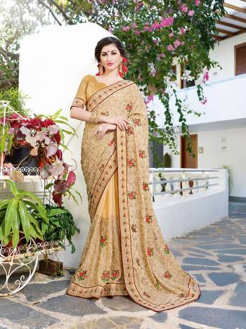 Rich And Elegant Looking Designer Saree Is Here In Beige Color Paired With Beige Colored Blouse. This Saree Is Georgette Based Paired With Art Silk Blouse, Beautified With Thread Embroidery And stone Work .It Is Light Weight And Easy To carry All Day Long.