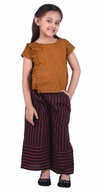 You Will Look Classy And Feel Comfy With This Lovely Pair In Musturd Yellow?Colored Top Paired With Black Colored Bottom. This Readymade Pair Is Fabricated On Khadi Cotton Which Ensures Superb comfort All Day Long.