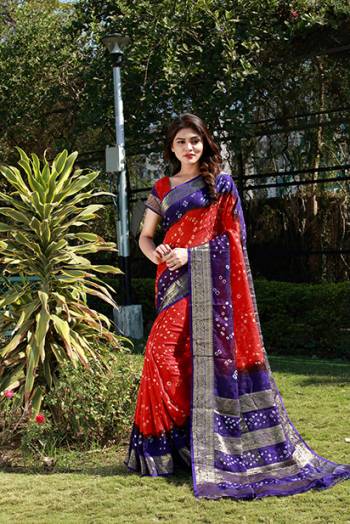 Beat This Heat This Summer With This Pretty Cotton Based Saree. This Saree And Blouse Are Fabricated On Art Cotton Beautified With Bandhani Prints All Over. It Is Light Weight And Easy To Carry All Day Long. 