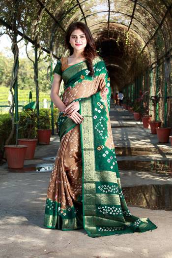 Add Some Casuals With This Beautiful Cotton Based Saree. This Saree And Blouse Are Fabricated On Art Cotton Beautified With Pretty Bandhani Prints All Over. Buy This Pretty Saree Now.