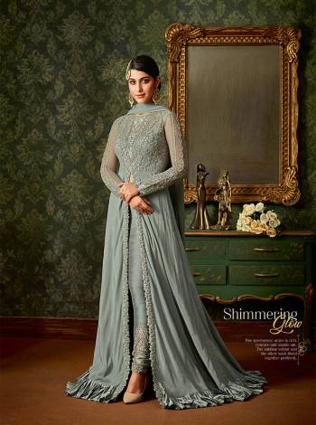 Rich And Elegant Looking New Shade Is Here To Add Into Your Wardrobe With This Designer Indo Western Suit In Steel Blue Color. Its Top Is Fabricated On Silk Georgette And Net Paired With Art Silk Fabricated Embroidered Bottom And Chiffon Dupatta. 