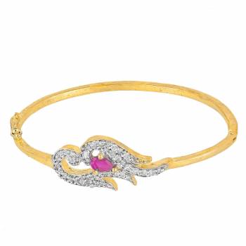 Give An Elegant Look To Your Wrist Wearing This Designer Bracelet In Golden Color Beautified With Attractive Diamond Work. This Bracelet Can Be Paired With Any Colored And Type Of Attire, Buy Now.