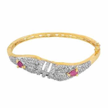 Give An Elegant Look To Your Wrist Wearing This Designer Bracelet In Golden Color Beautified With Attractive Diamond Work. This Bracelet Can Be Paired With Any Colored And Type Of Attire, Buy Now.