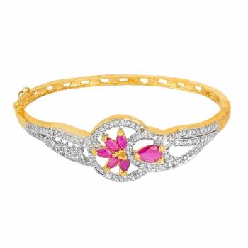 Give An Elegant Look To Your Wrist Wearing This Designer Bracelet In Golden Color Beautified With Attractive Diamond Work. This Bracelet Can Be Paired With Any Colored And Type Of Attire, Buy Now.