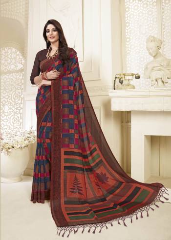 Go Colorful with This Saree In Multi Color Paired With Brown Colored Blouse. This Saree And Blouse are Fabricated On Art Silk Beautified With Multi Colored Checks Prints, Buy Now.