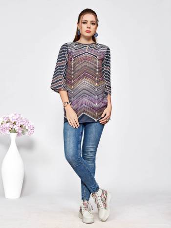 Beat The Heat This Summer With This Light Weight Top Fabricated On Muslin Which Is Also Soft Towards Skin. It Is Beautified With Prints All Over. Buy Now.