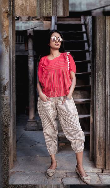 These Summer, Get This Trending Western Pair For Women. Its Top And Bottom Are Fabricated On Khadi Beautified With Prints. Its Unique Pattern And Subtle Color Pallete Will Ean You Lots Of Compliments From Onlookers. 