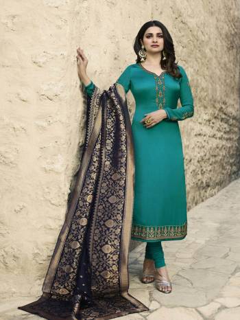 Go With The Shade Of Blue With This Designer Straight Suit In Blue Colored Top And Bottom Paired With Navy Blue Colored Dupatta. Its Top Satin Georgette Based Beautified With Attractive Embroidery Paired With Santoon Bottom And Banarasi Art Silk Dupatta. 