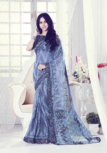 This Festive Season, Celebrate With Beauty And Comfort Wearing This Printed Saree. This Saree Is Fabricated On Georgette Brasso Paired With Art Silk Fabricated Blouse. It Is Beautified With Prints And Lace Border. Buy Now.