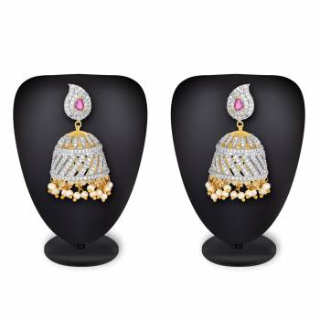 or Your Heavy Traditionals, Grab This Beautiful And Attractive Looking Earrings Set In Golden Color Beautified With Stone Work. This Can Be Paired With Any Colored Attire. 