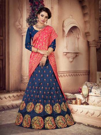 Grab This Heavy Designer Lehenga Choli For The Upcoming Festive And Wedding Season Which Comes With Two Dupattas. This Pretty Lehenga Choli IS Fabricated On Art Silk Paired With A Jacquard Silk Dupatta And Another Net Fabricated dupatta. 