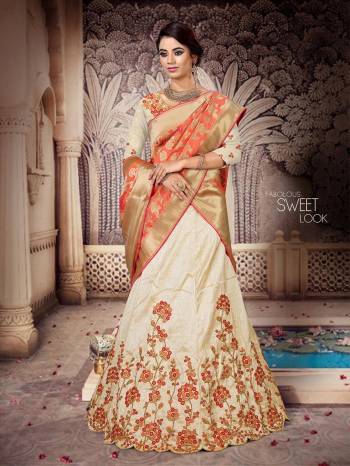 Here Is a Proper Indian Traditional Look With This Beautiful Designer Lehenga Choli. This Designer Lehenga Choli IS Silk Based Paired With Jacquard Silk Fabricated Dupatta And It Has Another Dupatta Fabricated On Net. It Is Beautified With Contrasting Heavy Embroidery Over Blouse And Lehenga Giving It A More Attractive Look.