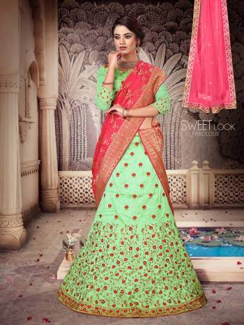 For A Pretty Festive Look, Grab This Heavy Embroidered Designer Lehenga Choli With Two Dupatta. This Lehenga Choli Is Silk Based Paired With A Very Pretty Jacquard Silk Dupatta And Another Net Fabricated Dupatta. Its Blouse And Lehenga Are Beautified With Contrasting Thread & Jari Embroidery. Buy Now. 