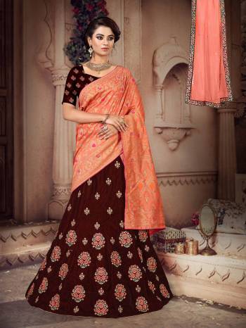 Here Is a Proper Indian Traditional Look With This Beautiful Designer Lehenga Choli. This Designer Lehenga Choli IS Silk Based Paired With Jacquard Silk Fabricated Dupatta And It Has Another Dupatta Fabricated On Net. It Is Beautified With Contrasting Heavy Embroidery Over Blouse And Lehenga Giving It A More Attractive Look.