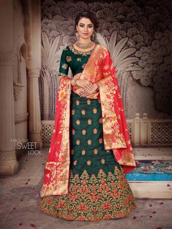 You Will Definitely Earn Lots Of Compliments Wearing This Heavy Designer Lehenga Which Has Two Dupatta Concept. This Heavy Embroidered Lehenga Choli Is Silk Based Paired With One Jacquard Silk Dupatta And Another Net Fabricated Dupatta. All Its Fabrics And Color Pallete Will Also Give A Rich Look To Your Personality.