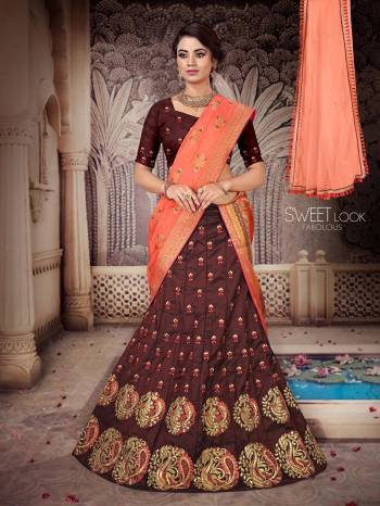 For A Pretty Festive Look, Grab This Heavy Embroidered Designer Lehenga Choli With Two Dupatta. This Lehenga Choli Is Silk Based Paired With A Very Pretty Jacquard Silk Dupatta And Another Net Fabricated Dupatta. Its Blouse And Lehenga Are Beautified With Contrasting Thread & Jari Embroidery. Buy Now. 