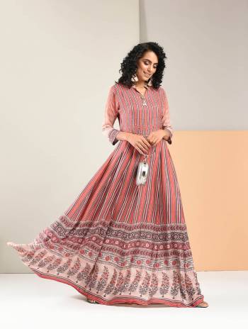 Look Pretty In This Designer Readymade Floor Length Gown In Pink Color Fabricated On Rayon. It Is Available In All Regular Sizes. Buy Now.