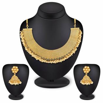 For A Queen Look, Here Is A Designer Royal Looking Necklace Set In Golden Color. This Necklace Set Can Be Paired With Heavy Ethnic Attire For More Enhanced Look. Buy Now