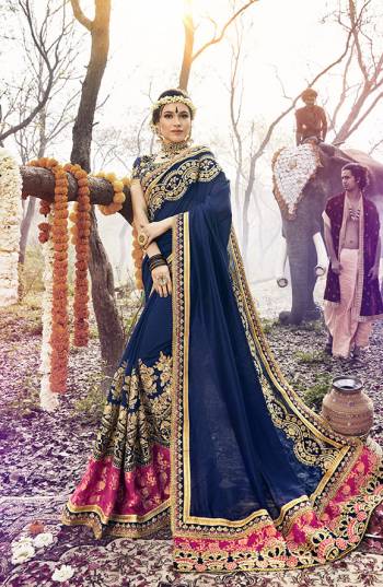 Grab This Beautiful Embroidered Designer Saree In Royal Blue Color Paired With Royal Blue Colored Blouse. This Saree Is Georgette Based Beautified With Heavy Embroidery Paired With Art Silk Fabricated Blouse. 