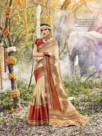 Rich And Elegant Looking Designer Saree Is Here In Beige Color Paired With Red Colored Blouse. This Saree Is Fabricated On Georgette Paired With Art Silk Fabricated Blouse. This Evergreen Color Pallete Will Earn you Lots Of Compliments From Onlookers. 