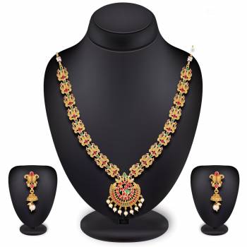 For A Queen Look, Here Is A Designer Royal Looking Necklace Set In Golden Color. This Necklace Set Can Be Paired With Heavy Ethnic Attire For More Enhanced Look. Buy Now