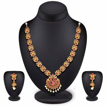 For A Queen Look, Here Is A Designer Royal Looking Necklace Set In Golden Color. This Necklace Set Can Be Paired With Heavy Ethnic Attire For More Enhanced Look. Buy Now