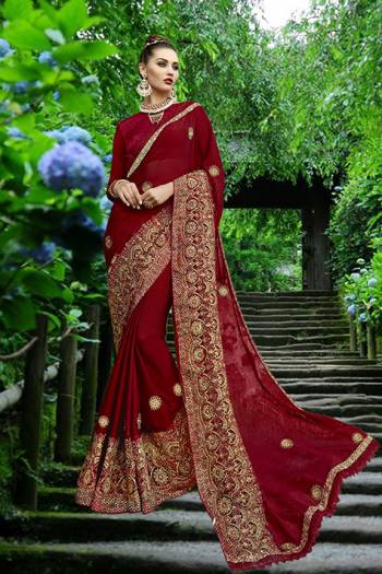 For an Enhanced Royal Look, Grab This Designer Saree In Maroon Color Paired With Maroon Colored Blouse. This Georgette Based Saree Is Piared With Art Silk Fabricated Blouse. Buy Now.