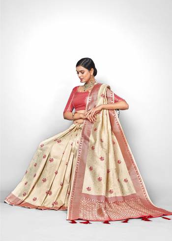 This Festive Season Look The Most Elegant Of All Wearing This Designer Silk based Saree Beautified With Weave All Over. This Saree Is Light Weight, Durable And Easy To Carry Throughout The Gala