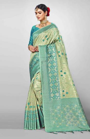 You Will Definitely Earn Lots Of Compliments In This Rich And Elegant Silk Based Saree, This Saree And Blouse are Beautified With Heavy Weave All Over, Giving It An Attractive Look