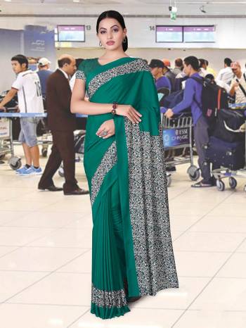 No More Worry For What To Wear At Your Place, Grab This Crepe Silk Fabricated Saree And Blouse Beautified With Prints All Over. This Saree Can Be Used As Uniform At Different Places Like Airports, Hospitals And Hotels. 