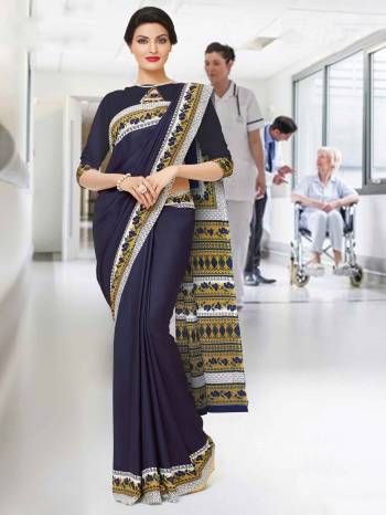 No More Worry For What To Wear At Your Place, Grab This Crepe Silk Fabricated Saree And Blouse Beautified With Prints All Over. This Saree Can Be Used As Uniform At Different Places Like Airports, Hospitals And Hotels. 