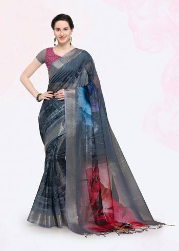 Feel Cool And Comfortable This Summer Wearing This Lovely Printed Saree. This Saree And Blouse are Fabricated On Linen Beautified With Prints. This Saree Is Light In Weight And Easy To Carry All Day Long. 