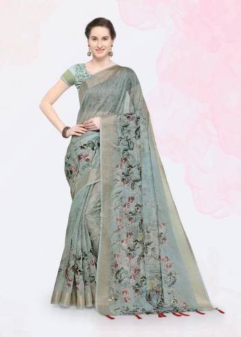 Feel Cool And Comfortable This Summer Wearing This Lovely Printed Saree. This Saree And Blouse are Fabricated On Linen Beautified With Prints. This Saree Is Light In Weight And Easy To Carry All Day Long. 