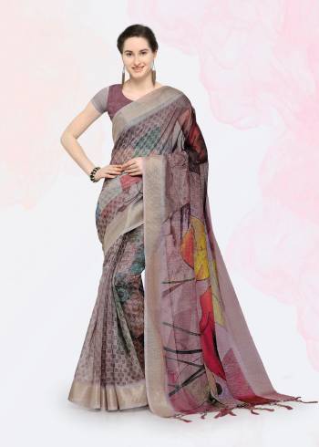 Feel Cool And Comfortable This Summer Wearing This Lovely Printed Saree. This Saree And Blouse are Fabricated On Linen Beautified With Prints. This Saree Is Light In Weight And Easy To Carry All Day Long. 