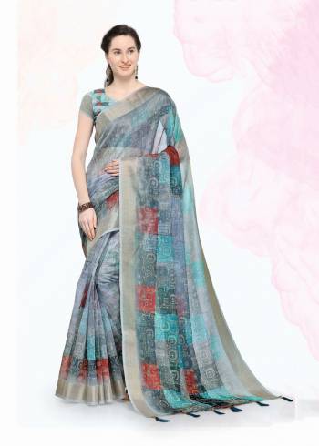 Add This Pretty Saree For Your Semi-Casuals With This Printed Saree Fabricated On Linen Paired With Linen Fabricated Blouse. Its Fabric And Color Ensures Superb Comfort All Day Long. Buy Now.