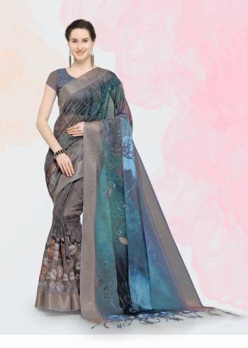 Add This Pretty Saree For Your Semi-Casuals With This Printed Saree Fabricated On Linen Paired With Linen Fabricated Blouse. Its Fabric And Color Ensures Superb Comfort All Day Long. Buy Now.