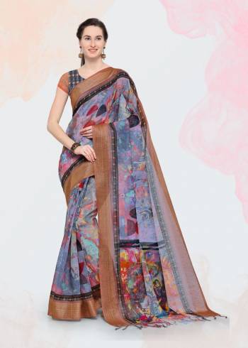 Feel Cool And Comfortable This Summer Wearing This Lovely Printed Saree. This Saree And Blouse are Fabricated On Linen Beautified With Prints. This Saree Is Light In Weight And Easy To Carry All Day Long. 