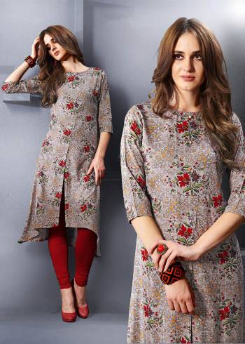 Go Colorful With This Pretty Kurti In Multi Color Fabricated On Rayon. Its Pretty Attractive Colors Are Perfect For Summers. Buy Now.