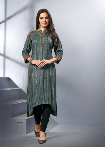 Go Colorful With This Pretty Kurti In Multi Color Fabricated On Rayon. Its Pretty Attractive Colors Are Perfect For Summers. Buy Now.