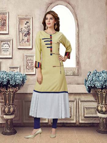 Grab This Pretty Unique Patterned Readymade Kurti In Pale Yellow And White Color Fabricated On Rayon, It Is Beautified With Prints And Available In All Regular Sizes. 