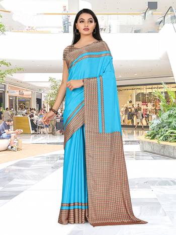 No More Worry For What To Wear At Your Place, Grab This Crepe Silk Fabricated Saree And Blouse Beautified With Prints All Over. This Saree Can Be Used As Uniform At Different Places Like Airports, Hospitals And Hotels.