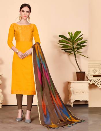 Shine Bright Wearing This Suit In Musturd Yellow Colored Top Paired With Contrasting Brown Colored Bottom And Multi Colored Dupatta. Its Top Is Fabricated On Jacquard Silk Paired With Cotton Bottom And Banarasi Art Silk Dupatta. Get This Stitched As PerYour Desired Fit And Comfort.