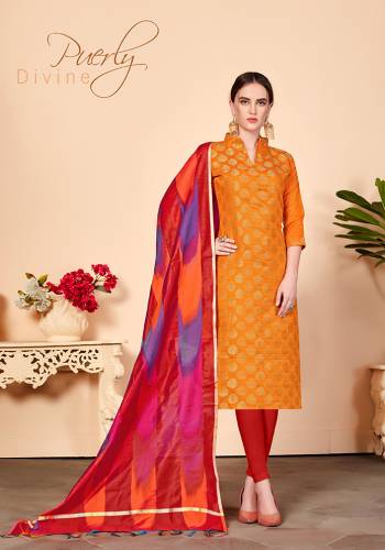 For Your Caasuals Or Semi-Casuals, Grab This Pretty Dress Material In Orange Colored Top Paired With Contrasting Red Colored Bottom And Dupatta. Its Top Is Fabricated On Jacquard Silk Paired With Cotton Fabricated Bottom And Banarasi Art Silk Dupatta. Buy Now.