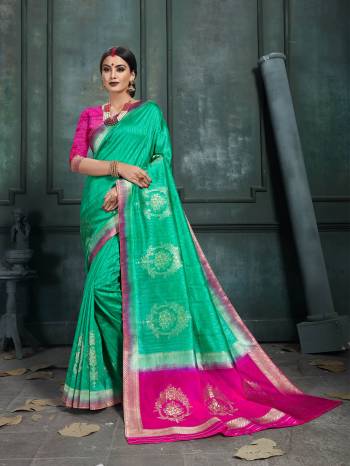 This Festive Season Look The Most Elegant Of All Wearing This Designer Silk based Saree Beautified With Weave. This Saree Is Light Weight, Durable And Easy To Carry Throuhout The Gala