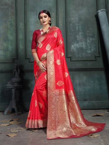 Look Pretty In This Designer Silk Based Saree Beautified With Weave All Over. Its Rich Fabric And Unique Weave Pattern Will Earn You Lots Of Compliments From Onlookers.